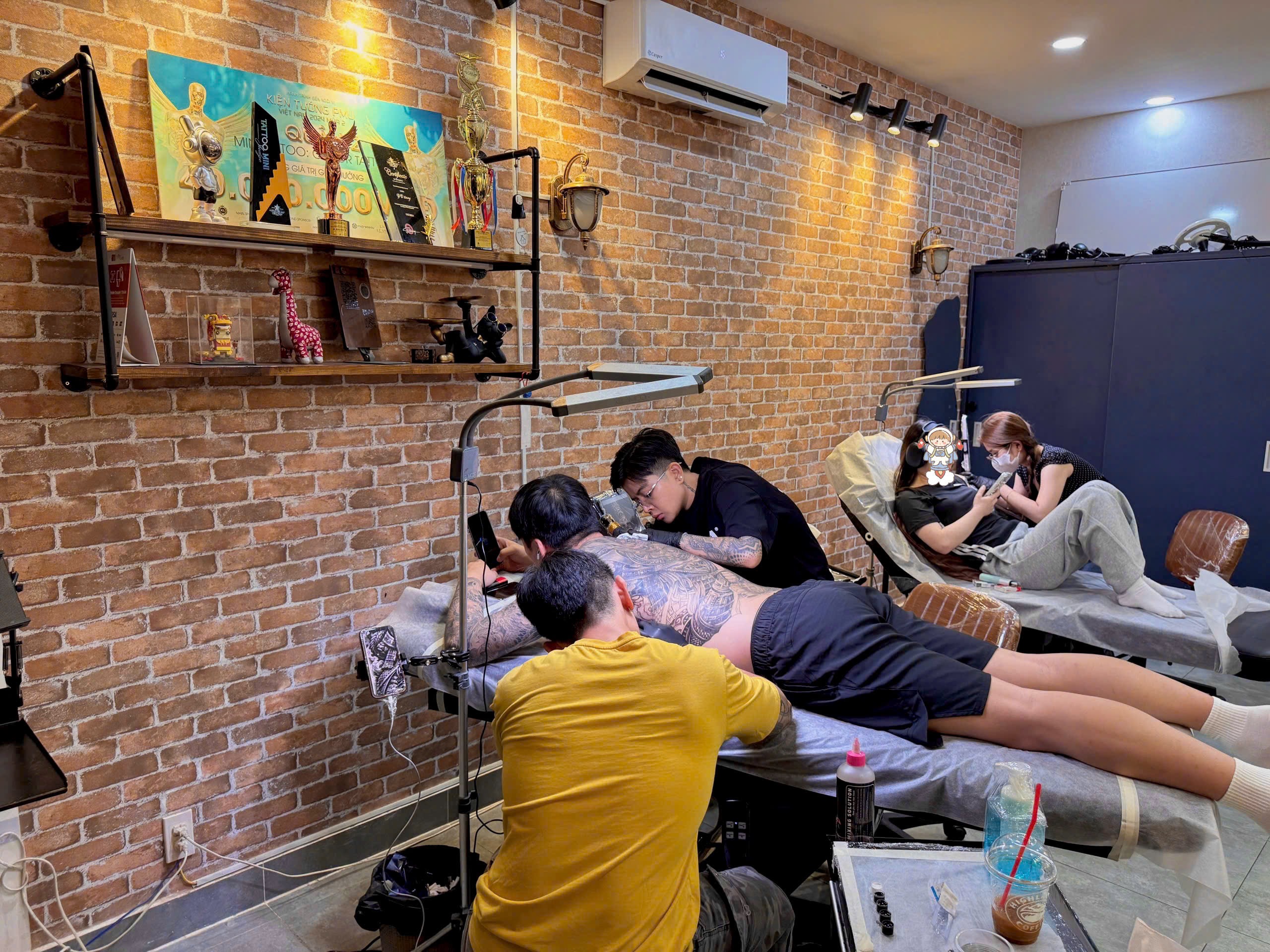 real tattoo clients inside tattoo studio ho chi minh city